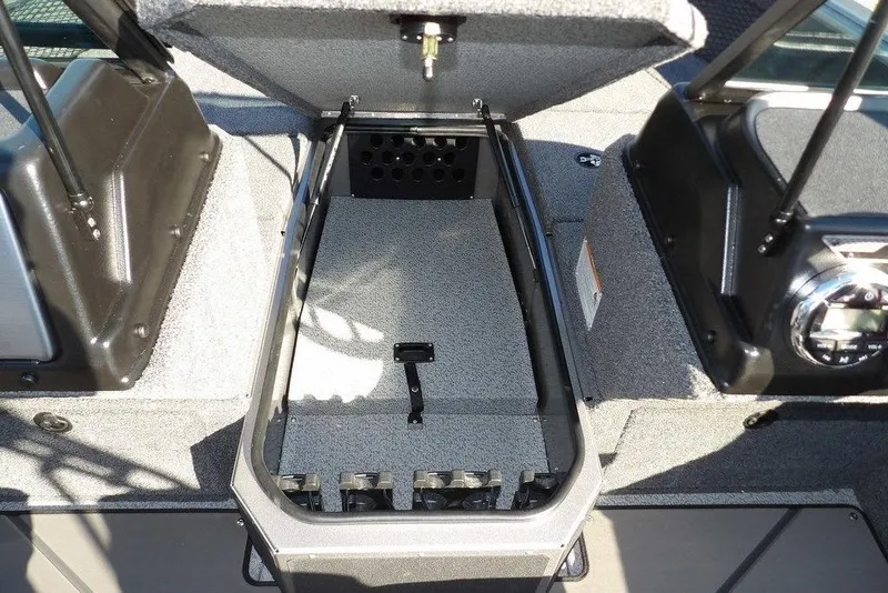 Slide: The Image of 2026 Lund 2075 Impact XS boat interior storage compartment open. - 42
