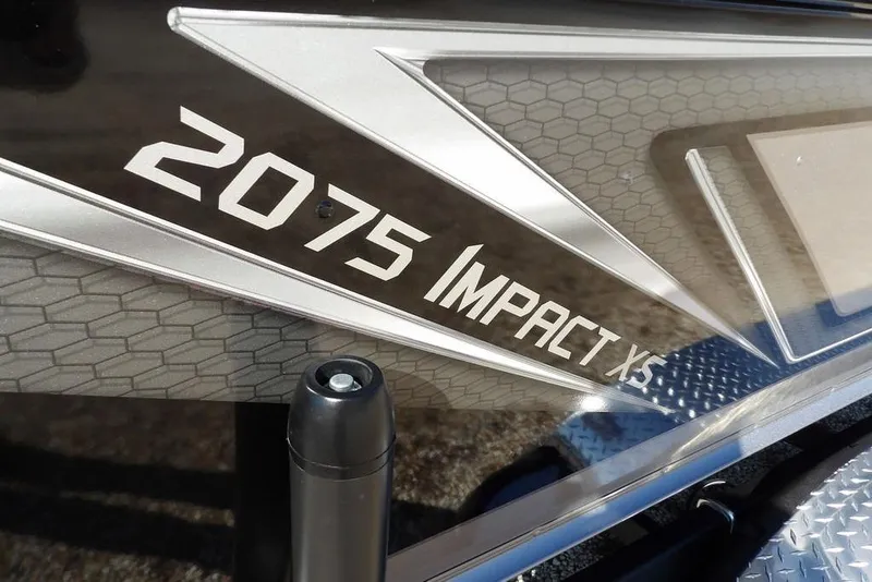 Slide: The Image of 2026 Lund 2075 Impact XS boat model detail with sleek design elements. - 53