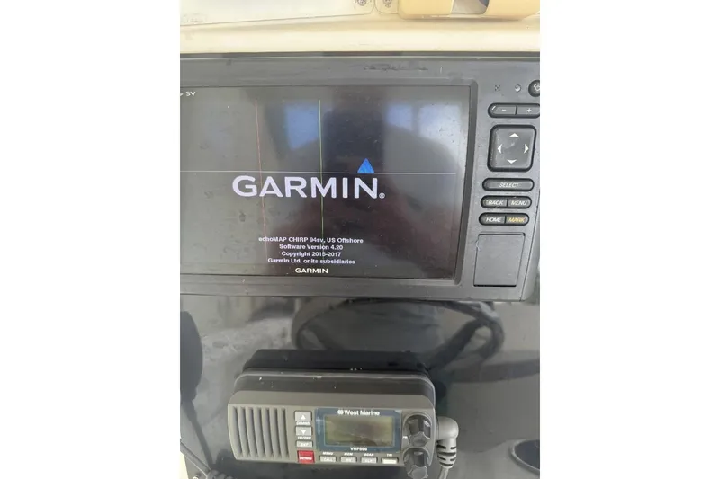 Slide: The Image of Garmin navigation system on 2009 Atlantic 275 CC boat dashboard. - 8