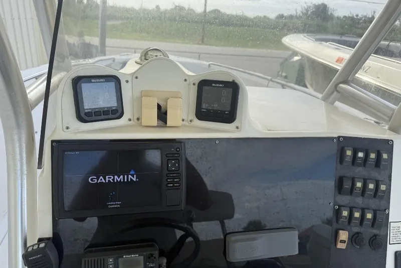Slide: The Image of Dashboard of 2009 Atlantic 275 CC boat with Garmin navigation system. - 9