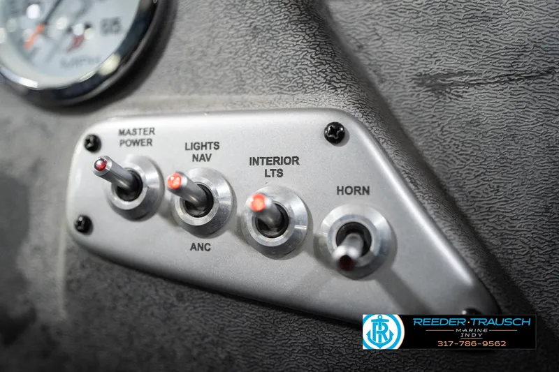 Slide: The Image of Control panel of 2020 Lund 1875 Pro-V Bass boat with switches and gauge. - 30