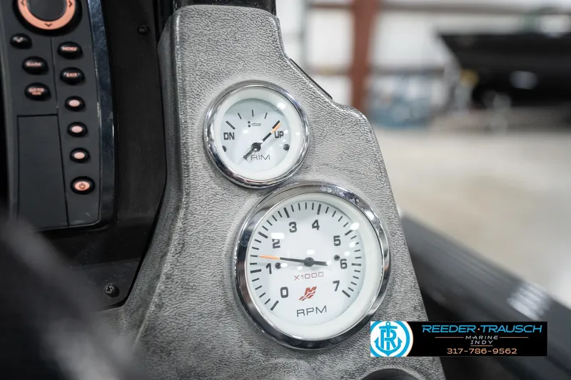 Slide: The Image of Dashboard of 2020 Lund 1875 Pro-V Bass boat with RPM and trim gauges. - 33