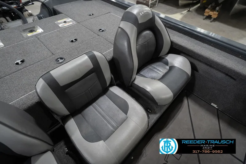 Slide: The Image of 2020 Lund 1875 Pro-V Bass boat interior with gray and black seating. - 38