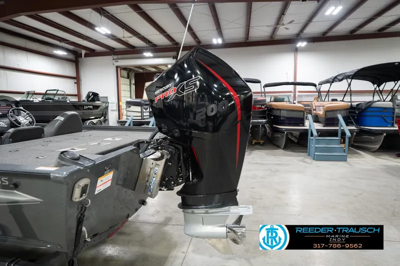 Slide: The Image of 2020 Lund 1875 Pro-V Bass boat with Mercury Pro XS engine in showroom. - 44