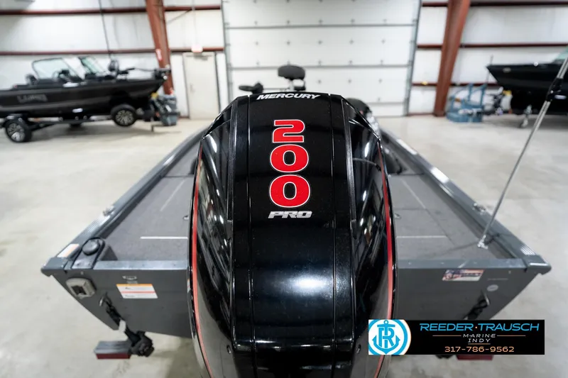 Slide: The Image of 2020 Lund 1875 Pro-V Bass boat with Mercury 200 Pro engine in showroom. - 46