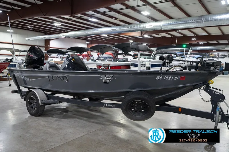 Slide: The Image of 2020 Lund 1875 Pro-V Bass boat on trailer in indoor showroom. - 5