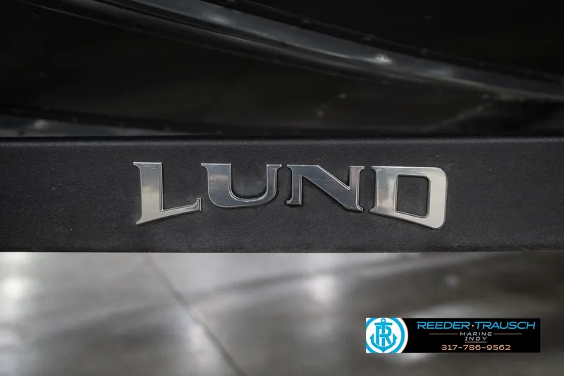 Slide: The Image of 2020 Lund 1875 Pro-V Bass boat logo with Reeder Trausch Marine contact details. - 57