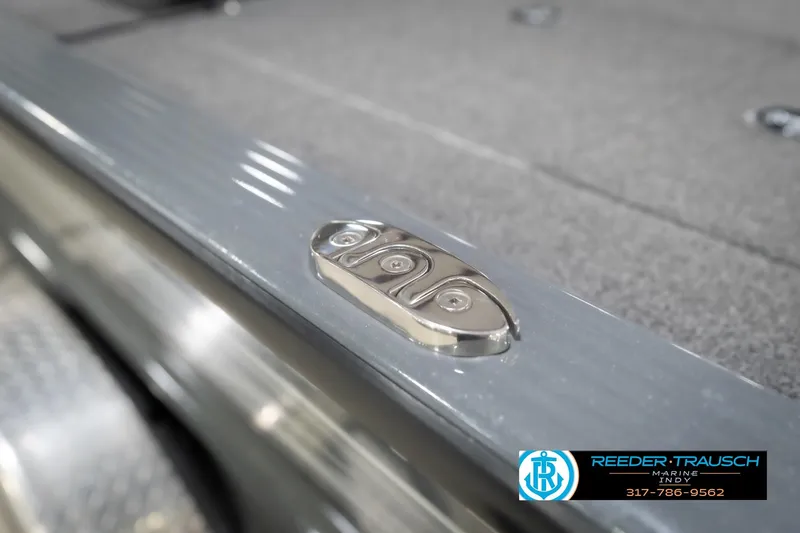 Slide: The Image of 2020 Lund 1875 Pro-V Bass boat detail with Reeder Trausch Marine logo. - 59