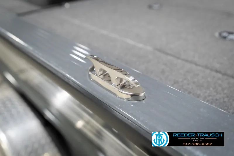 Slide: The Image of 2020 Lund 1875 Pro-V Bass boat cleat detail, Reeder Trausch Marine logo visible. - 60