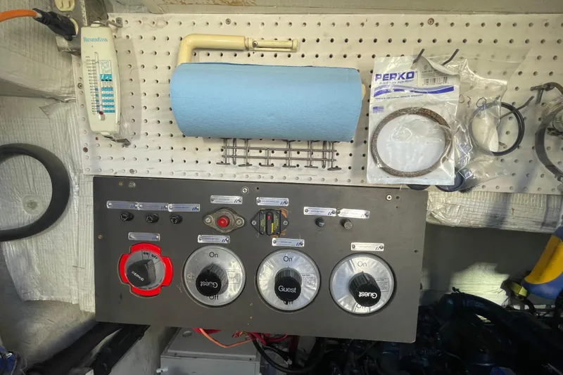 Slide: The Image of Control panel of a 1988 Bayliner 3888 Motoryacht with tools and accessories. - 30