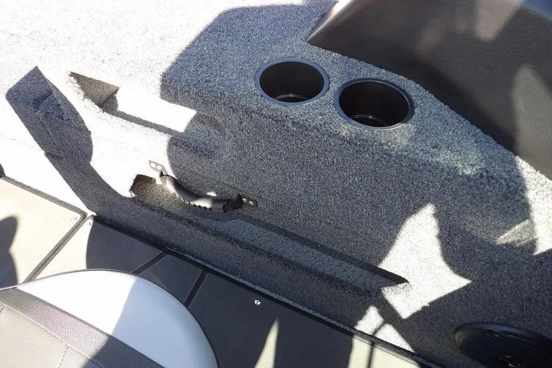 Slide: The Image of Interior of 2026 Lund 2075 Impact XS boat with cup holders and handle. - 35