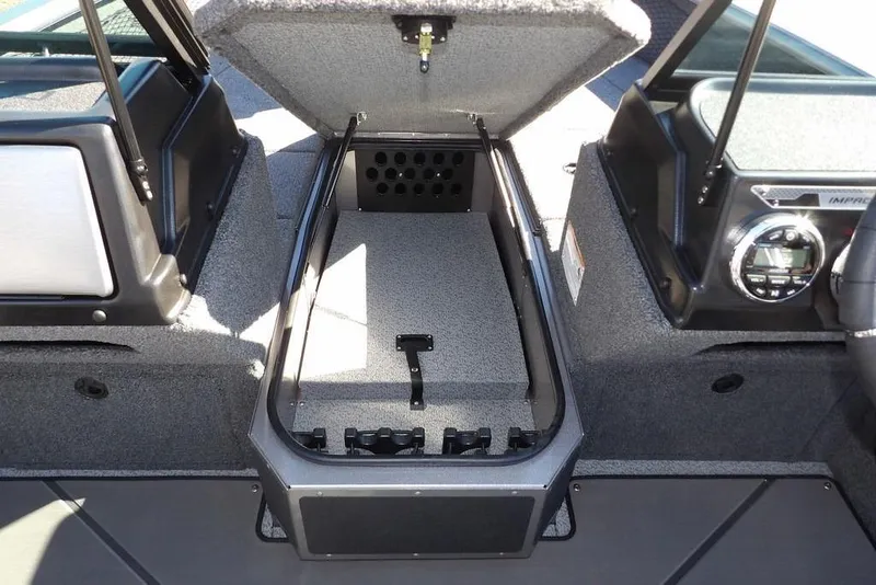 Slide: The Image of 2026 Lund 2075 Impact XS boat interior with open storage compartment. - 39