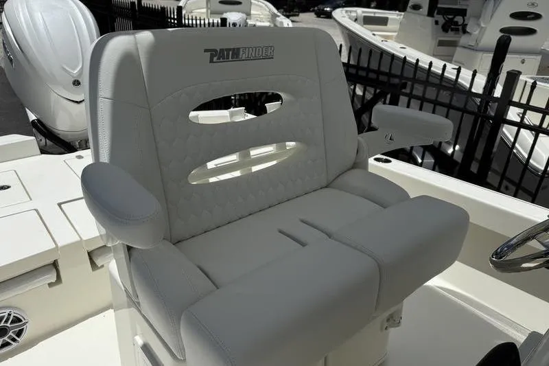 Slide: The Image of 2025 Pathfinder 2600 TRS boat seat with armrests and sleek design. - 14