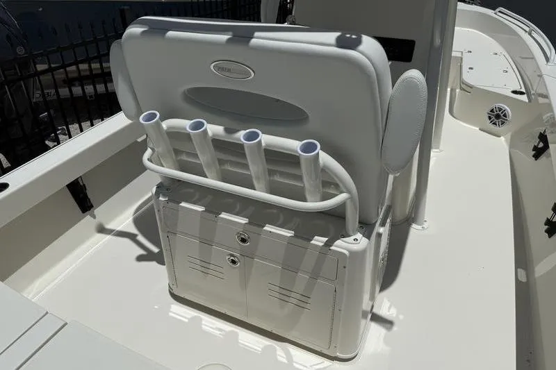 Slide: The Image of 2025 Pathfinder 2600 TRS boat interior with rod holders and storage compartments. - 15