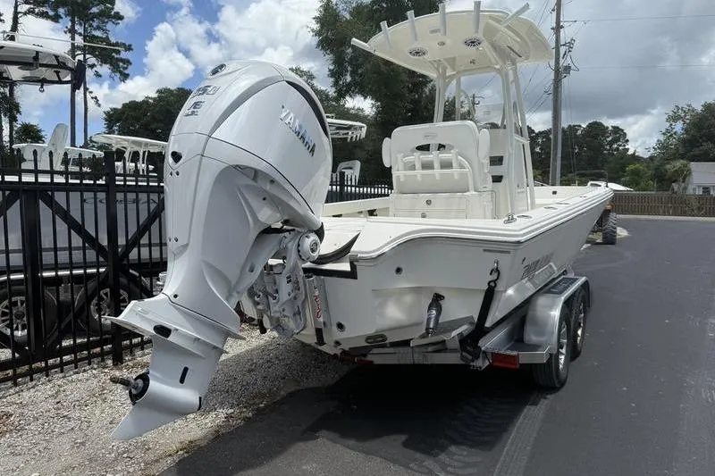 Slide: The Image of 2025 Pathfinder 2600 TRS boat with Yamaha outboard engine on trailer. - 4