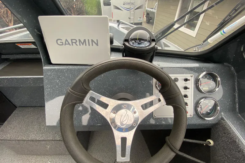 Slide: The Image of 2022 Duckworth 20XT Advantage boat dashboard with Garmin navigation and gauges. - 10
