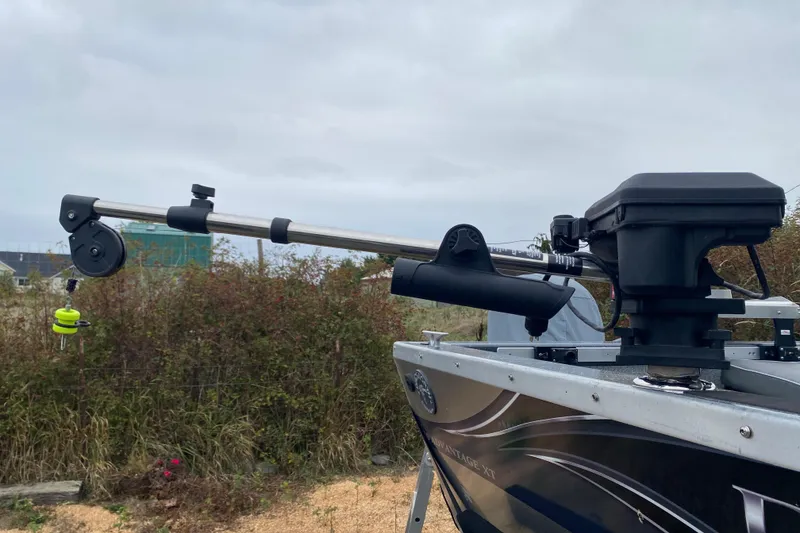 Slide: The Image of 2022 Duckworth 20XT Advantage boat with mounted fishing equipment, outdoors. - 23