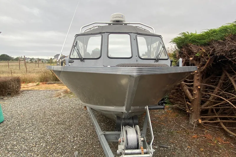 Slide: The Image of 2022 Duckworth 20XT Advantage boat on trailer, parked outdoors. - 5