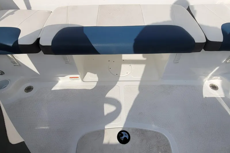 Slide: The Image of 2022 Tahoe 185 S WT boat interior with blue and white seating. - 28
