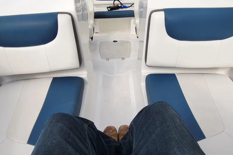 Slide: The Image of Interior view of 2022 Tahoe 185 S WT boat with blue and white seating. - 32