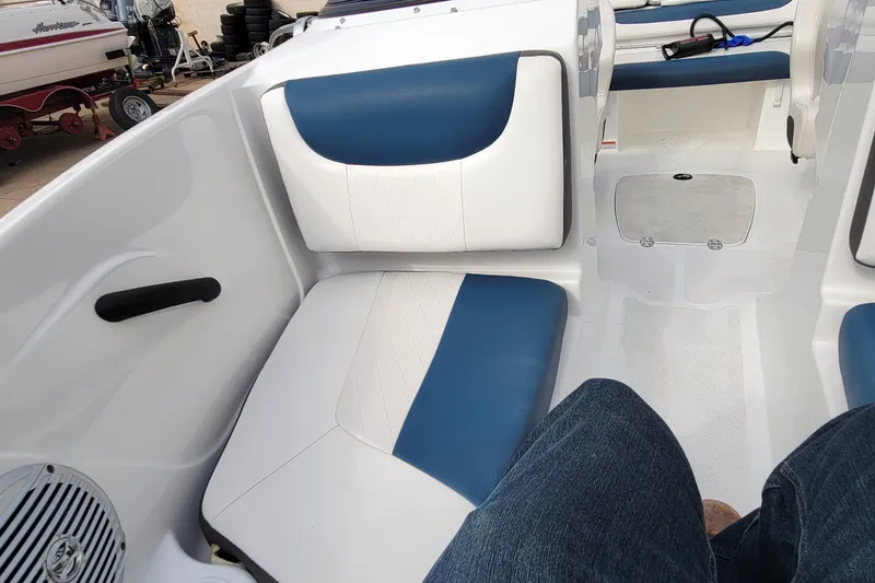 Slide: The Image of 2022 Tahoe 185 S WT boat interior with blue and white seating. - 33