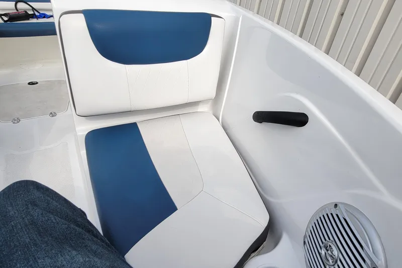 Slide: The Image of 2022 Tahoe 185 S WT boat interior with blue and white seating. - 34