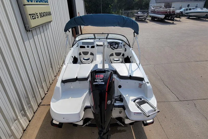 Slide: The Image of 2022 Tahoe 185 S WT boat with Mercury 115 outboard motor, parked at Ted's Boatarama. - 4