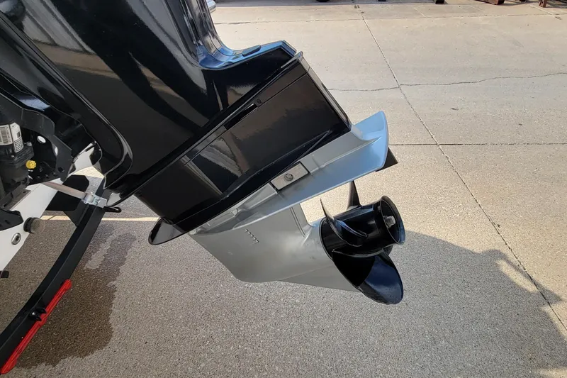 Slide: The Image of 2022 Tahoe 185 S WT boat motor and propeller on concrete surface. - 9