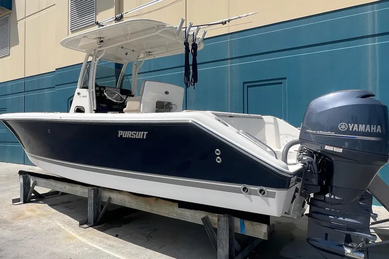 Slide: The Image of 2015 Pursuit C 260 Center Console boat with Yamaha outboard motor. - 1