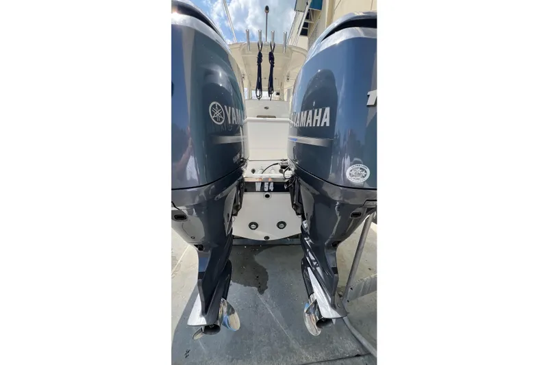 Slide: The Image of 2015 Pursuit C 260 Center Console with dual Yamaha outboard motors. - 27