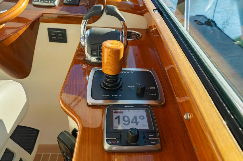 Slide: The Image of Hinckley Picnic Boat MK III 2015 helm with joystick control and navigation display. - 21