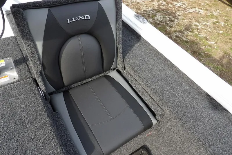 Slide: The Image of 2026 Lund 2075 Pro-V Bass XS boat seat with gray upholstery and logo. - 15
