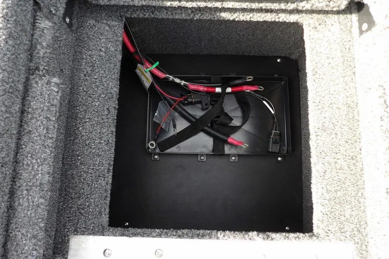 Slide: The Image of Battery compartment of 2026 Lund 2075 Pro-V Bass XS boat, featuring wiring and secure installation. - 20