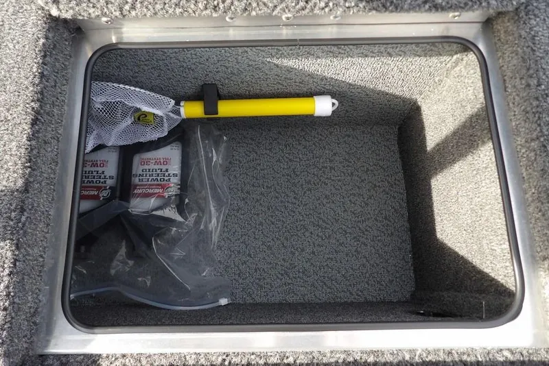 Slide: The Image of Storage compartment in 2026 Lund 2075 Pro-V Bass XS boat with fishing gear. - 23