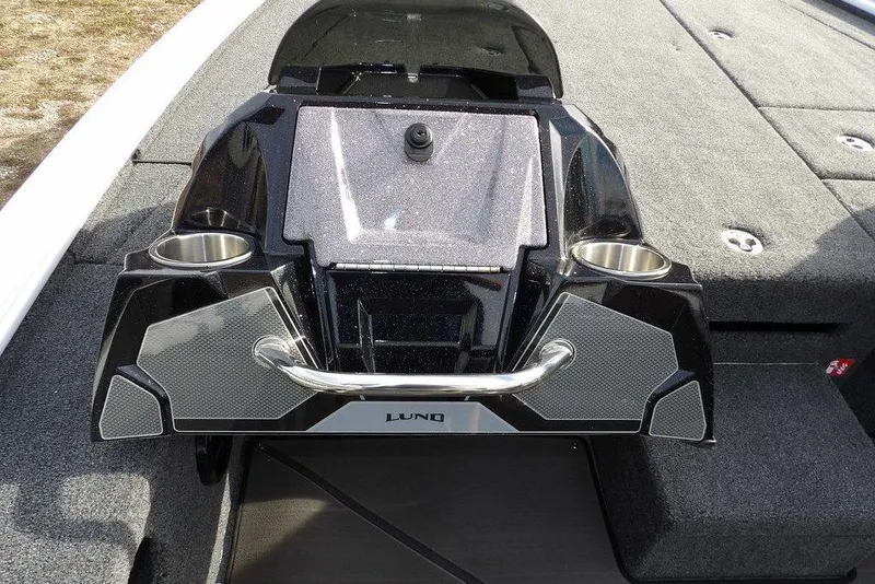 Slide: The Image of 2026 Lund 2075 Pro-V Bass XS boat interior with cup holders and storage. - 27
