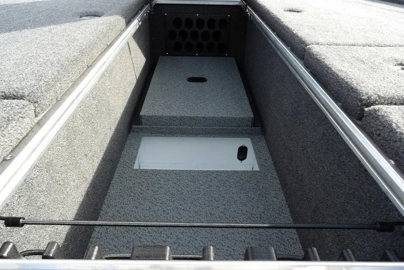 Slide: The Image of Interior view of 2026 Lund 2075 Pro-V Bass XS boat storage compartment. - 37