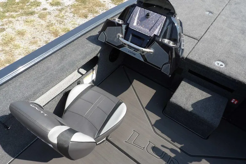Slide: The Image of 2026 Lund 2075 Pro-V Bass XS boat interior with seat and console. - 31