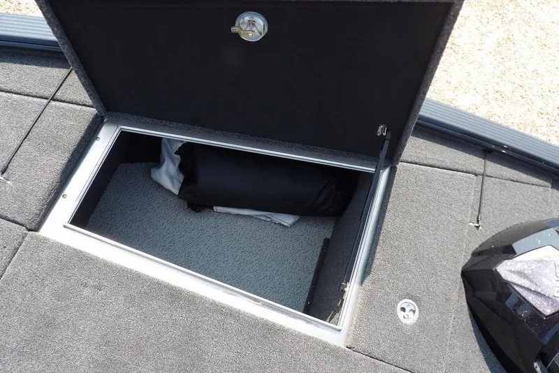 Slide: The Image of Open storage compartment in 2026 Lund 2075 Pro-V Bass XS boat. - 46