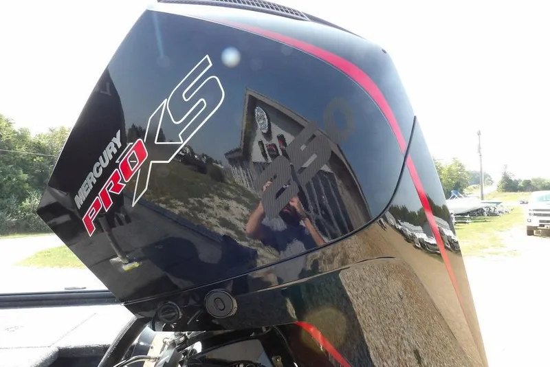 Slide: The Image of Mercury Pro XS engine on 2026 Lund 2075 Pro-V Bass XS boat, outdoors. - 60