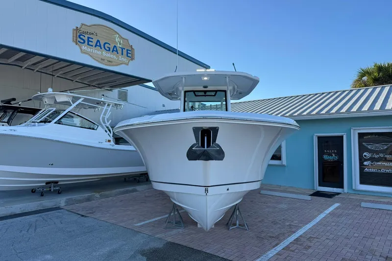 Slide: The Image of 2026 Crevalle 33 CSF boat displayed at Gaston's Seagate Marine Sales. - 2
