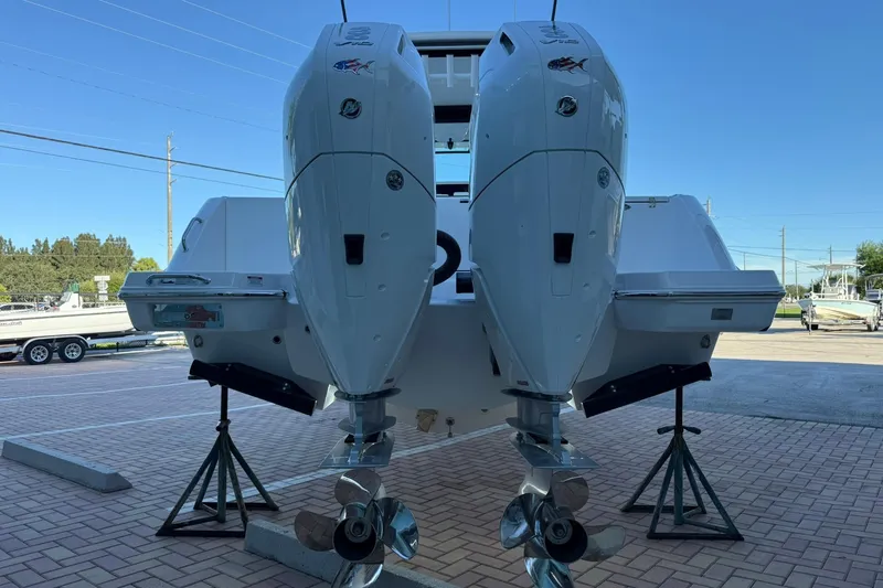 Slide: The Image of 2026 Crevalle 33 CSF boat with dual outboard engines on display. - 4