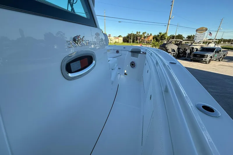 Slide: The Image of 2026 Crevalle 33 CSF boat exterior with sleek white design and modern features. - 43
