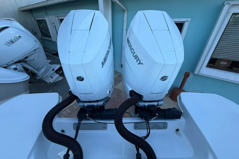 Slide: The Image of Twin Mercury Verado outboard engines on a 2026 Crevalle 33 CSF boat. - 5