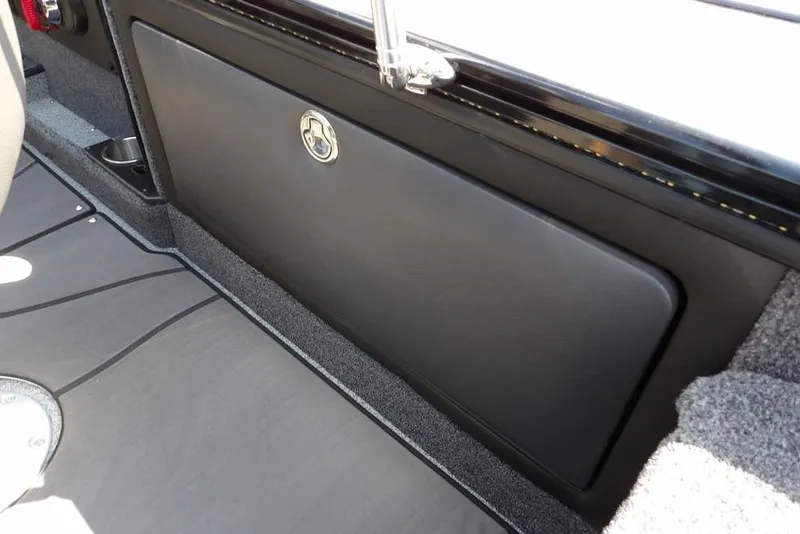Slide: The Image of Interior view of 2026 Lund 2075 Pro-V Sport boat, featuring sleek storage compartment. - 18