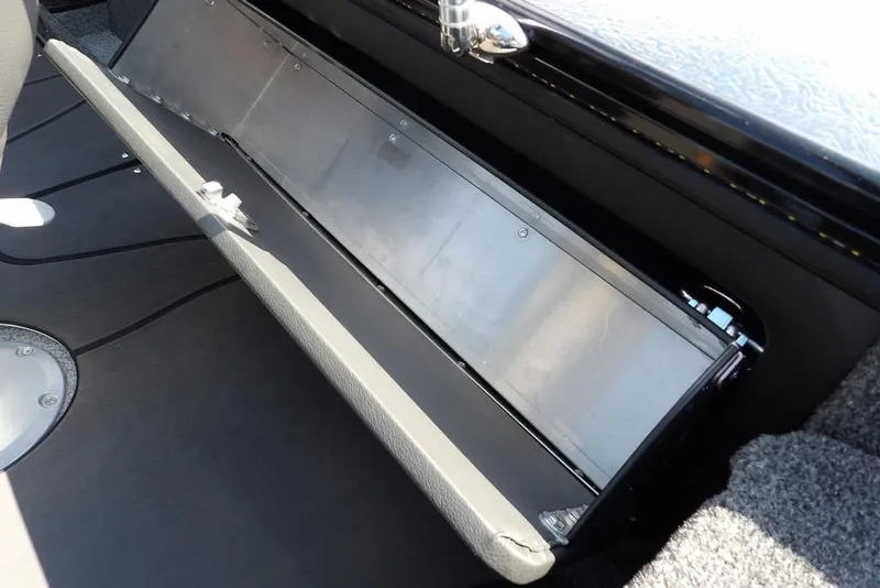 Slide: The Image of 2026 Lund 2075 Pro-V Sport boat storage compartment, open and empty. - 20