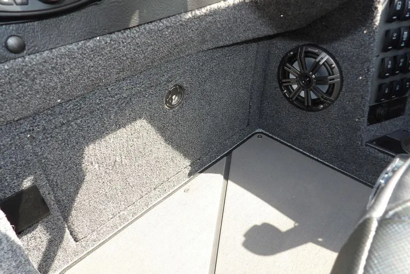 Slide: The Image of Interior of 2026 Lund 2075 Pro-V Sport boat with speaker and carpeted finish. - 35