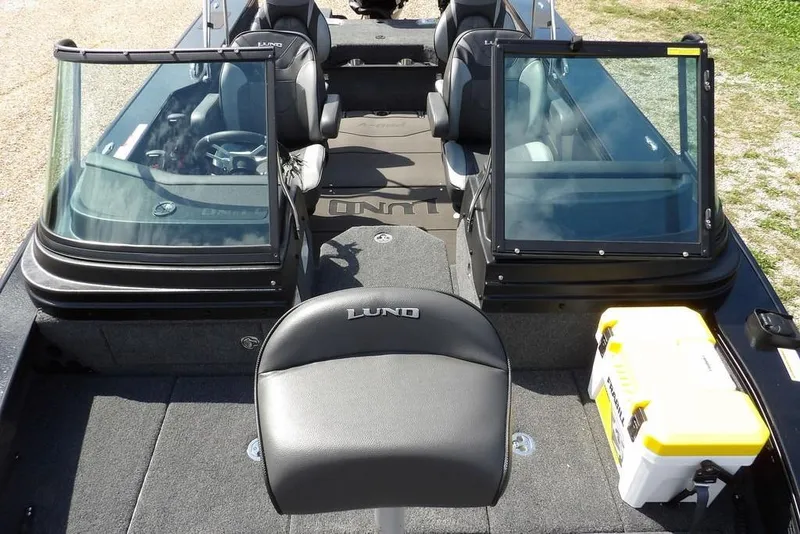 Slide: The Image of 2026 Lund 2075 Pro-V Sport boat interior with seating and storage compartments. - 43