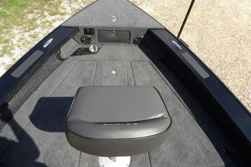 Slide: The Image of 2026 Lund 2075 Pro-V Sport boat interior with seating and carpeted deck. - 50