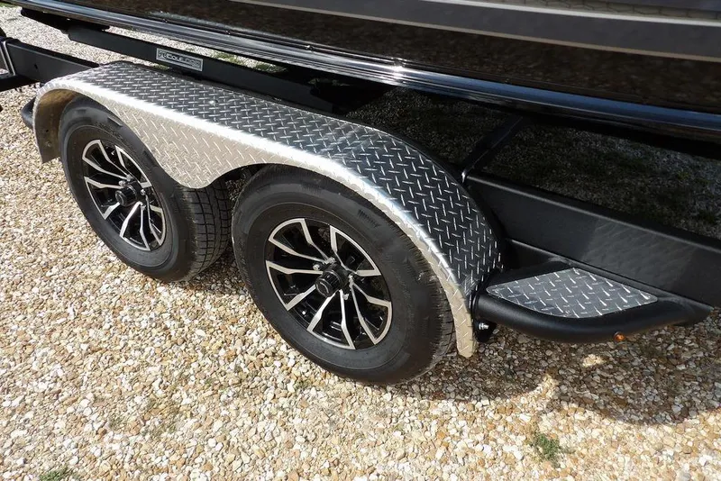 Slide: The Image of Trailer wheels of 2026 Lund 2075 Pro-V Sport on gravel surface. - 58