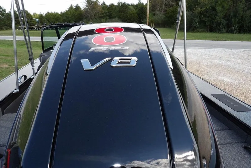 Slide: The Image of 2026 Lund 2075 Pro-V Sport boat with V8 engine, sleek black design. - 65